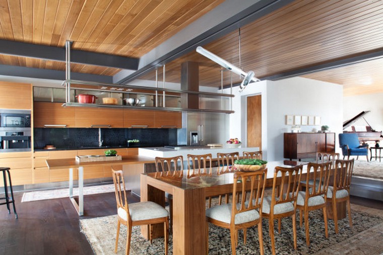 The Adelaide Midcentury Modern House is one of Ray Kappe’s prefab Livinghomes that’s made up of 11 modules installed on a beautiful lot in Santa Monica over the course of just two days. With a focus on indoor/outdoor living, the design is split over multiple levels that help define certain areas while remaining open and light. Complementing the home’s style are the warm, modern interiors that were designed by DKD LTD.